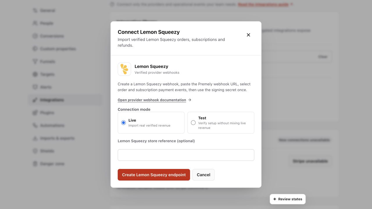 Premely Lemon Squeezy revenue setup dialog in Light mode with the real Lemon Squeezy logo and webhook controls.